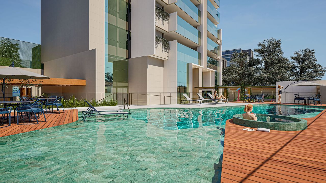 Render da piscina com raia e deque de madeira, ao pé da torre.